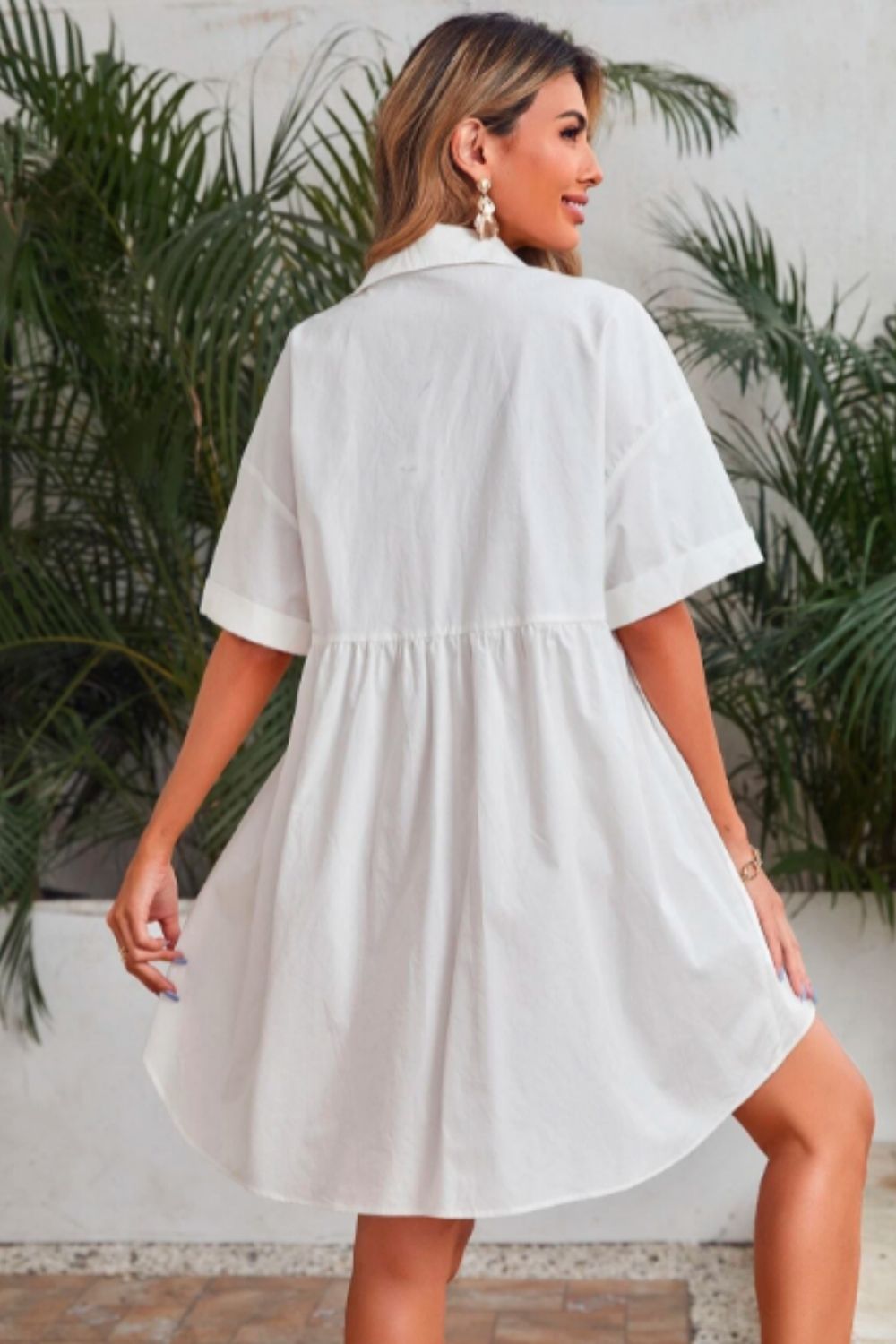 Asymmetrical clearance button dress